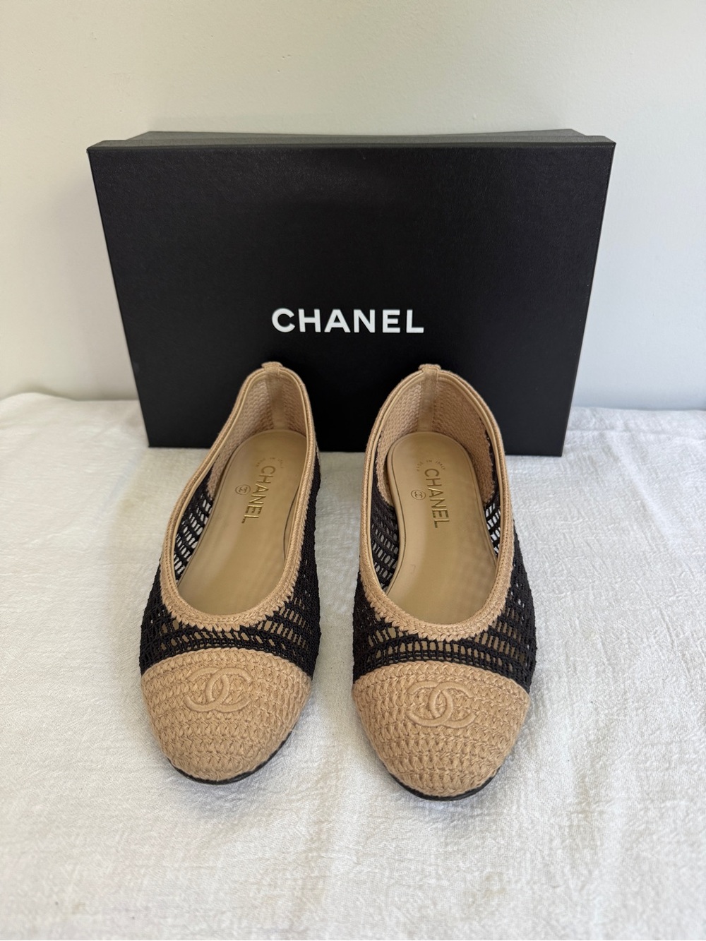 CHANEL Beige and Black Crochet Cap-Toe Ballet Flats